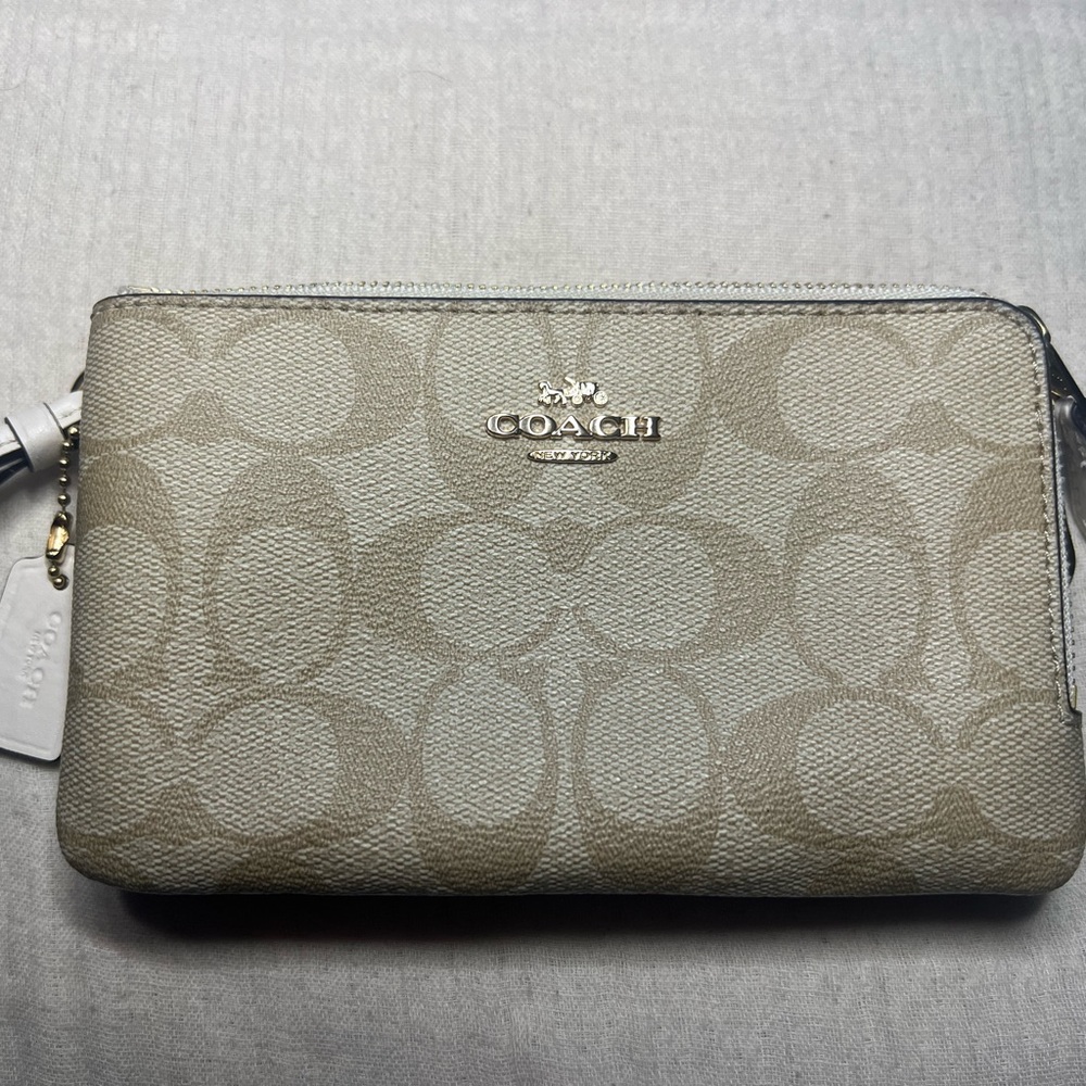 Coach Signature PVC Double Corner Zip wristlet.